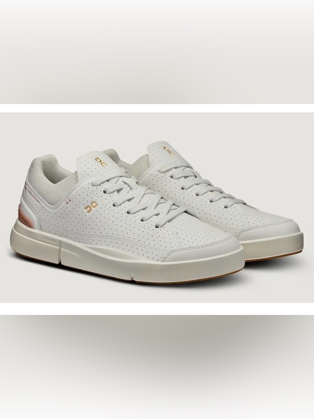 On Running Women's Perforated White Sneakers with Gold Accents
